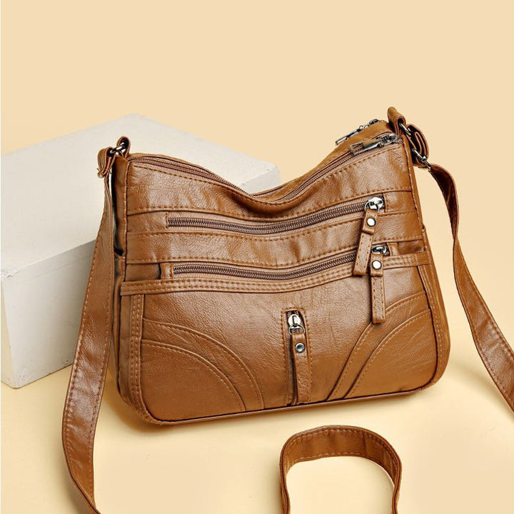 Esme - Crossbody-taske med flere rum