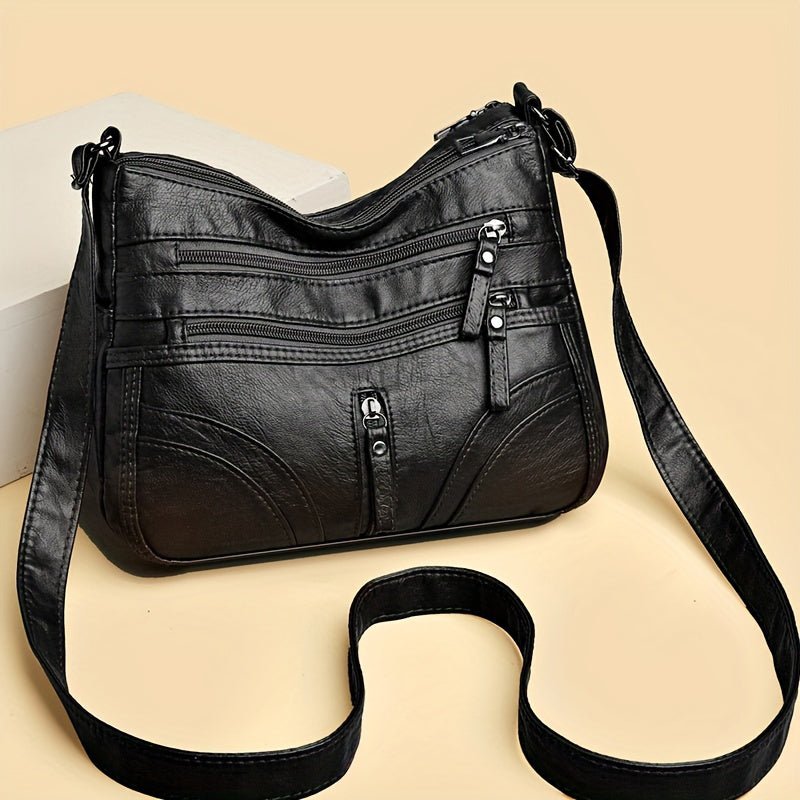 Esme - Crossbody-taske med flere rum