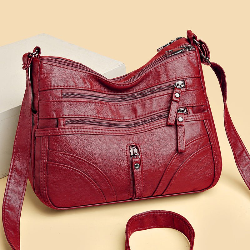 Esme - Crossbody-taske med flere rum