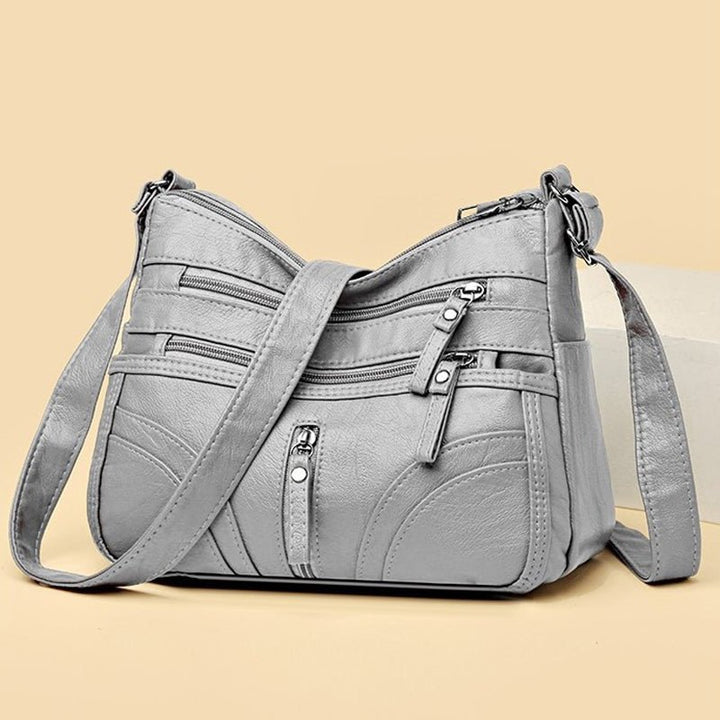 Esme - Crossbody-taske med flere rum