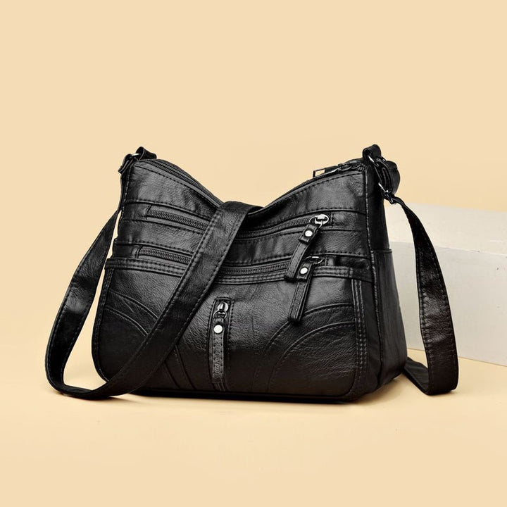 Esme - Crossbody-taske med flere rum