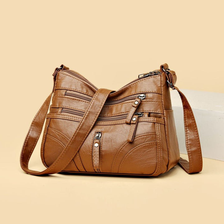 Esme - Crossbody-taske med flere rum