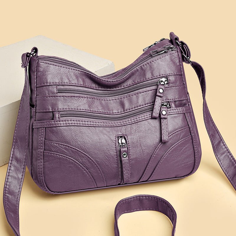 Esme - Crossbody-taske med flere rum