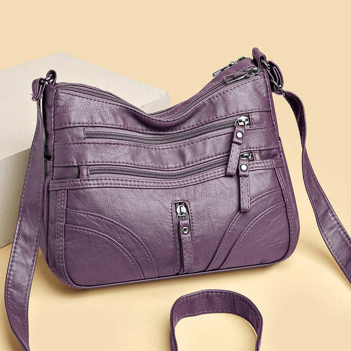 Esme - Crossbody-taske med flere rum
