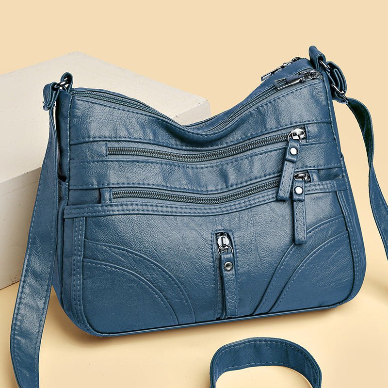 Esme - Crossbody-taske med flere rum