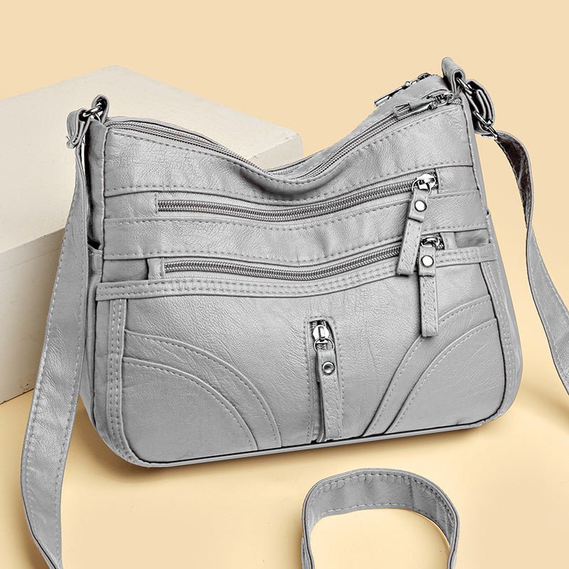 Esme - Crossbody-taske med flere rum