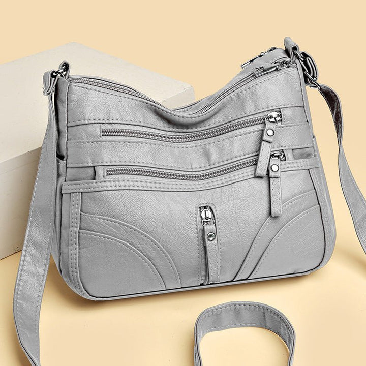Esme - Crossbody-taske med flere rum